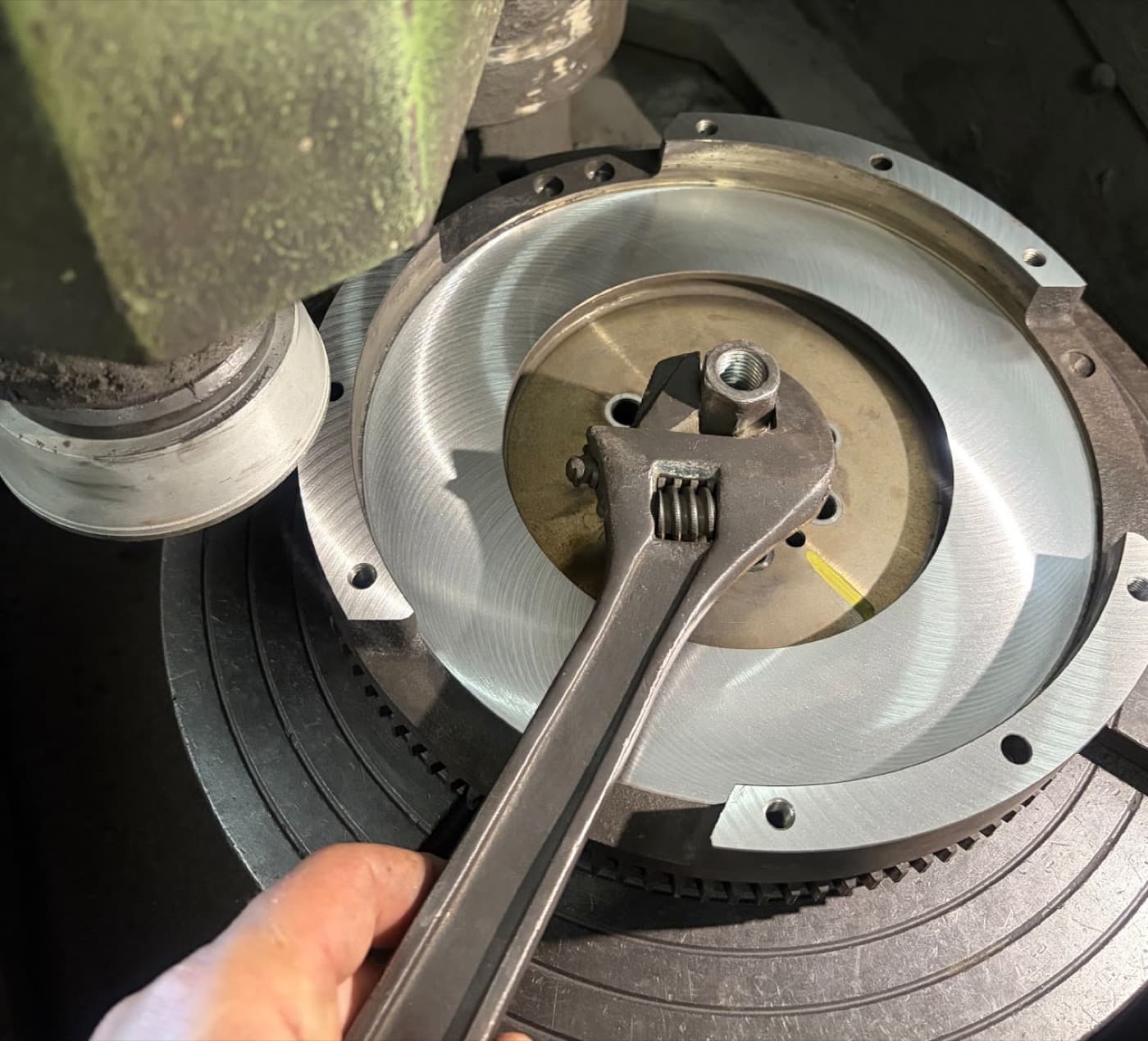 A flywheel mounted on the machine at Fastbrake, its friction face freshly resurfaced