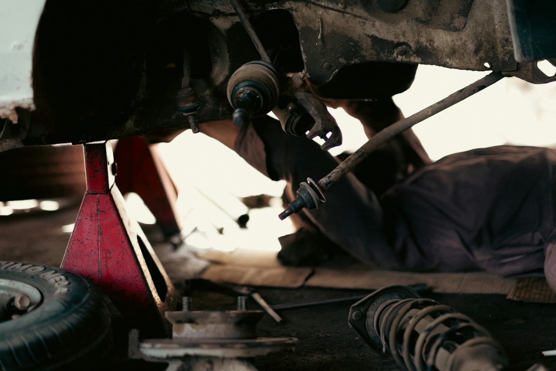 Suspension components on the underside of a raised vehicle